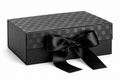 Black gift box with a dotted lid and black satin ribbon